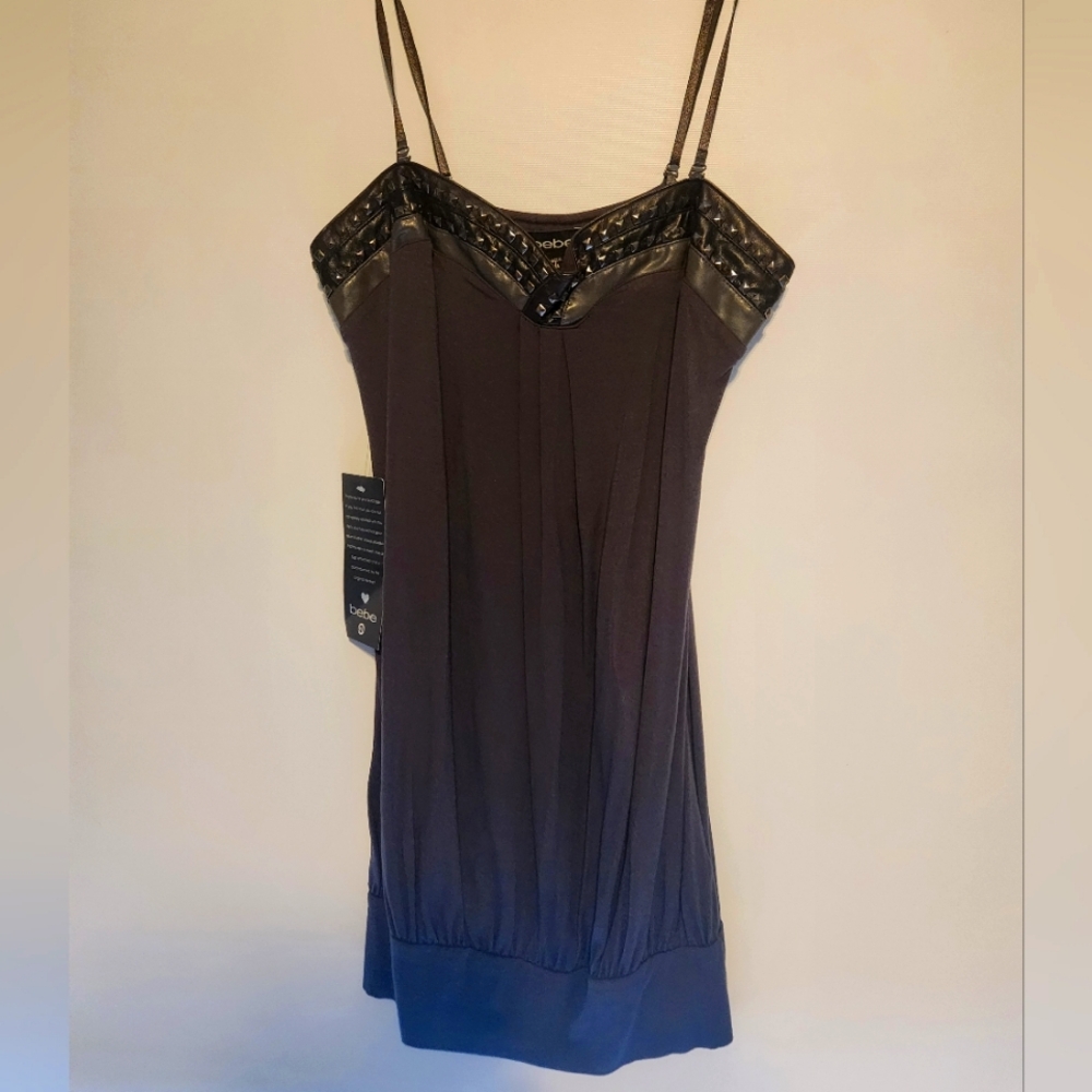 Large, charcoal gray, brand new Bebe dress. Never worn.